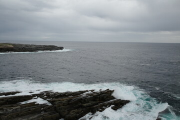 waves crashing on rocks