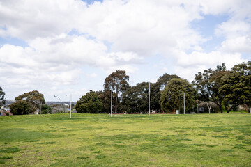 outside afl football oval, empty on a sunny day