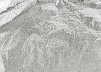 Silver background metallic texture wrapping foil paper shiny white grey metal backdrop for wall paper decoration element
