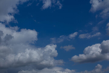 Fototapeta na wymiar Clear blue sky with beautiful cloudscape, white clouds nature background