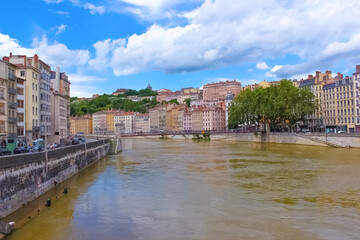 Fototapeta premium Lion, France - June 16, 2716: View from river Sona to the bridge and Lyon city,