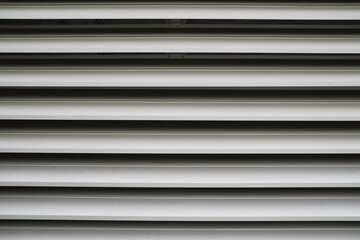 Obraz premium abstract metal background with horizontal lines and dark and light pockets for unique abstract patterning