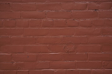 Fototapeta premium red brick wall texture pattern in an outdoor environment