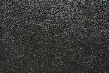 black asphalt texture with dark color and uneven surface