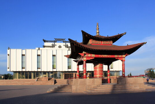 Kyzyl, Tuva (Tyva, Tyva Republic), Russia - May, 2017. National Music and Drama Theater of the Tyva Republic. Buddhist prayer wheel on Arat square.