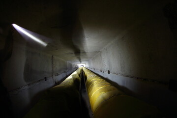 underground sewer pipes with lighting