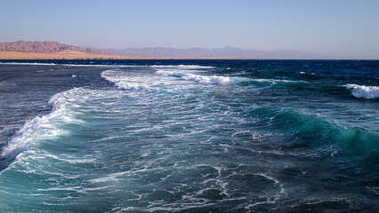 Beautiful raging seas with sea foam and waves