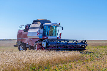 Combines and other equipment in the fields during the wheat harvest