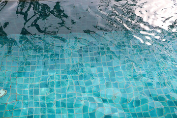 Close up blue water in swimming pool