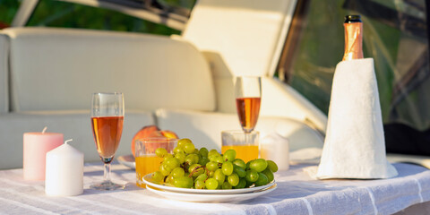 Romantic breakfast or dinner on a motor yacht. Hard sunlight.