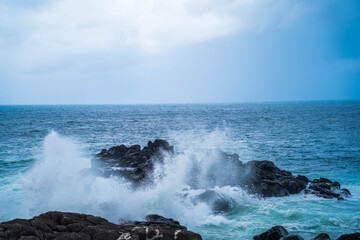 Waves breaking on the rocks