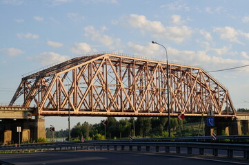 Railway bridge over the Moscow Volga canal on a Sunny summer morning. Moscow region. Russia.