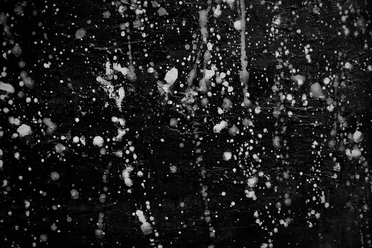 Background splash black on paper. Creative abstract art from ink and Alcohol ink colors. Marble texture. Oil painting on canvas. Hand oil painting. Color texture. Fragment of artwork. Spots of paint. © aekkawin