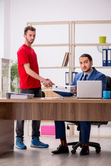 Young man delivering pizza to the office
