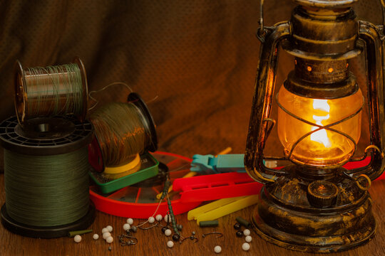 fishing equipment and antique kerosene lamp