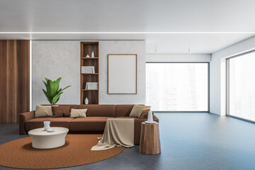 Concrete and brown living room with poster