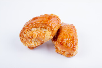 fresh sweet cookies in icing sugar for tea, isolated on a white background