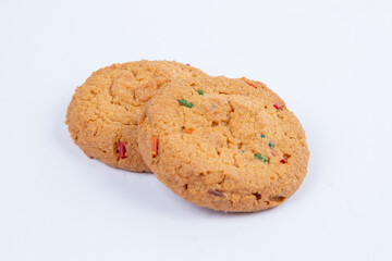 fresh sweet cookies with candied fruits, isolated on a white background