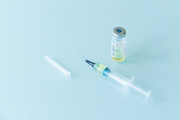 medical syringe and vials with vaccine, medicine