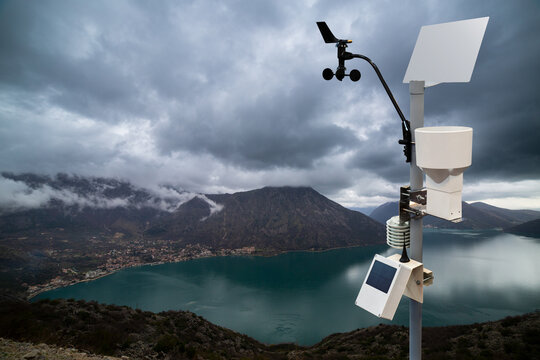 Meteorological station for measuring weather in the background of the dramatic sky