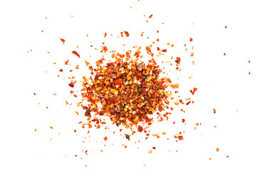 Pile crushed red pepper, dried chili flakes and seeds isolated on white background.