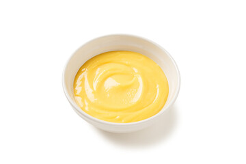 Homemade vanilla custard pudding or lemon curd in a white  bowl  isolated on white background - obrazy, fototapety, plakaty