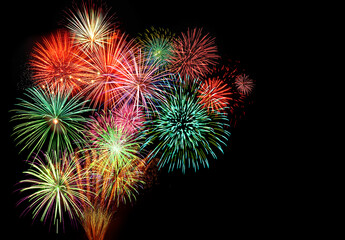 Dazzling colorful fireworks light up the sky with big and bright display 