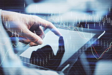 Multi exposure of man's hands holding and using a phone and financial chart drawing. Market analysis concept.