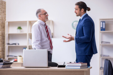 Two employees in the office