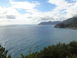 Cinque Terre, Italy - 08/31/2020: Beautiful landscape of a coastal fishing village, amazing view on many little colorful houses, traditional architecture of the little Italian town called Cinque Terre