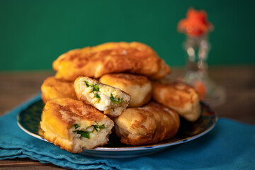 homemade fried pies with egg and onions