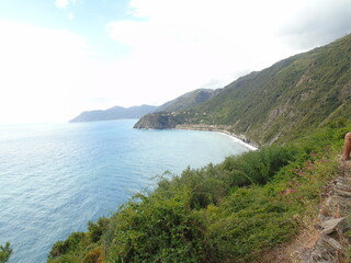 Cinque Terre, Italy - 08/31/2020: Beautiful landscape of a coastal fishing village, amazing view on many little colorful houses, traditional architecture of the little Italian town called Cinque Terre