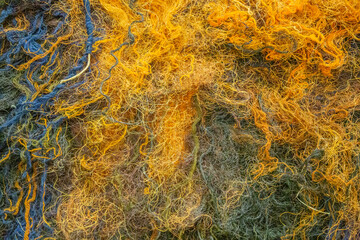 Natural wool carpet with abstract textured knitted elements