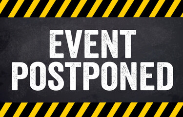 Black chalkboard with message This event is postponed
