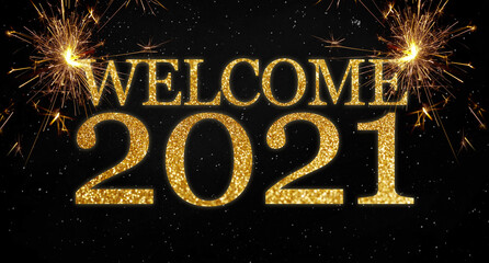 Black background with sparklers and glittery letters showing the words welcome and happy new year...