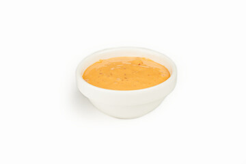 Spicy sauce in a bowl on a white background. For the restaurant menu. Traditional Japanese sushi seasoning. Healthy eating