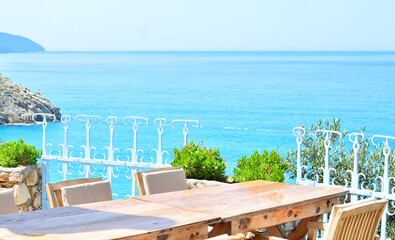 Mediterranean landscape. Empty wooden table against the beautiful sea view.