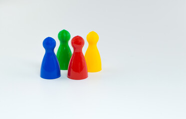 Board game pieces (red, blue, green, yellow)