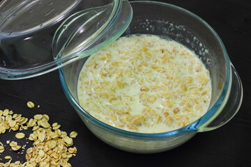 Oatmeal with milk cooked in the microwave