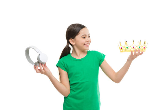 royalty free music. pop princess. queen of music. portrait of cheerful girl isolated on white. happy childhood. small girl choose between crown and headphones. being a super star. best hit list