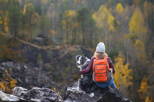 the girl and dog relax