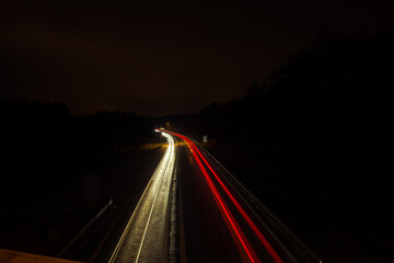 Fototapeta na wymiar light trail on the highway at night