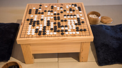 Chinese or Japanese strategy board Go game.