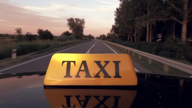 Hyper lapse footage of intercity taxi driving through countryside landscape