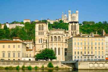 View of the Saone river embankment with Lyon Cathedral of Saint Jean Baptiste, Lyon, France