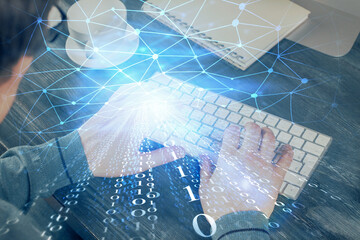 Double exposure of tech drawings with hands working on computer background. Concept of innovation.