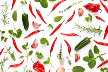Spice herbal leaves and chili pepper on white background. Vegetables pattern. Floral and vegetables on white background. Top view, flat lay.