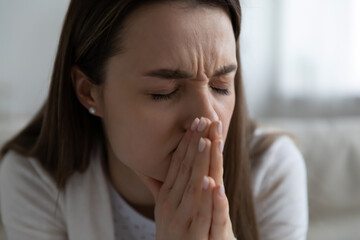 Depressed unhappy young woman suffering from personal psychological problems. Head shot close up nervous anxious millennial girl feeling doubtful about hard decision, stressful situation concept.