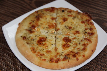 Juicy freshly cooked Italian pizza from the oven