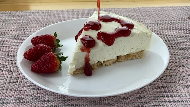 delicious cheesecake with strawberries on  plate